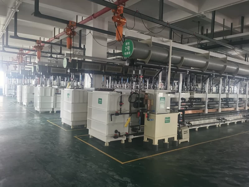 PCB wet process line with chemical tanks, pump piping, and circulation equipment